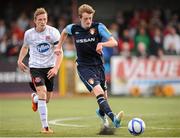7 October 2012; Chris Forrester, St. Patrick's Athletic, in action against Michael Rafter, Dundalk. FAI Ford Cup semi-final, Dundalk v St Patrick’s Athletic, Oriel Park, Dundalk, Co. Louth.Picture credit: David Maher / SPORTSFILE