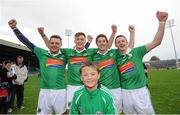 7 October 2012; Kilmallock players, from left to right, Derek O'Mahony, Gavin O'Mahony, Eoin Ryan, and Kevin O'Mahony, along with supporter Conor Hanley, aged 10, celebrate after victory over Adare. Limerick County Senior Hurling Championship Final, Adare v Kilmallock, Gaelic Grounds, Limerick. Picture credit: Diarmuid Greene / SPORTSFILE