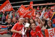 7 October 2012; Cork forwards Valerie Mulcahy and Rhona Ní Bhucachalla celebrate with supporters from Douglas, Co. Cork.  TG4 All-Ireland Ladies Football Senior Championship Final, Cork v Kerry, Croke Park, Dublin. Picture credit: Ray McManus / SPORTSFILE
