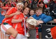 7 October 2012; Cork players Valerie Mulcahy, left, and Riona Ní Bhuachalla celebrate with the Brendan Martin Cup after the game. TG4 All-Ireland Ladies Football Senior Championship Final, Cork v Kerry, Croke Park, Dublin. Picture credit: Brendan Moran / SPORTSFILE
