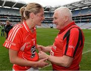 7 October 2012; Cork's Juliet Murphy celebrates with manager Eamonn Ryan after the game. TG4 All-Ireland Ladies Football Senior Championship Final, Cork v Kerry, Croke Park, Dublin. Picture credit: Brendan Moran / SPORTSFILE