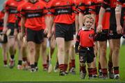 7 October 2012; Adare mascot Jordan O'Donoghue, aged 4, with the team during the the pre-match parade. Limerick County Senior Hurling Championship Final, Adare v Kilmallock, Gaelic Grounds, Limerick. Picture credit: Diarmuid Greene / SPORTSFILE