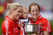 7 October 2012; Megan Walsh, age 1, from Killeagh, Cork, with her godmother Anne Marie Walsh, right, and Angela Walsh.  TG4 All-Ireland Ladies Football Senior Championship Final, Cork v Kerry, Croke Park, Dublin. Picture credit: Stephen McCarthy / SPORTSFILE