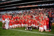 7 October 2012; The Cork team, including manager Eamonn Ryan, celebrate with the Brendan Martin Cup after the game. TG4 All-Ireland Ladies Football Senior Championship Final, Cork v Kerry, Croke Park, Dublin. Picture credit: Ray McManus / SPORTSFILE