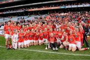 7 October 2012; The Cork team, including manager Eamonn Ryan, celebrate with the Brendan Martin Cup after the game. TG4 All-Ireland Ladies Football Senior Championship Final, Cork v Kerry, Croke Park, Dublin. Picture credit: Brendan Moran / SPORTSFILE