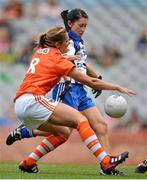 7 October 2012; Linda Wall, Waterford, is fouled by Sinéad McCleary, Armagh, resulting in a penalty. TG4 All-Ireland Ladies Football Intermediate Championship Final, Armagh v Waterford, Croke Park, Dublin. Picture credit: Brendan Moran / SPORTSFILE
