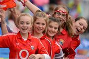 7 October 2012; Cork supporters, from left, Katie Atteridge, Lily O'Meara, Rose Doyle, Ella Lynch and Orla O'Regan, all from Mallow, cheer from the Cusack Stand. TG4 All-Ireland Ladies Football Senior Championship Final, Cork v Kerry, Croke Park, Dublin. Picture credit: Ray McManus / SPORTSFILE