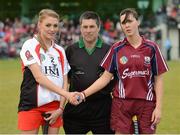 29 September 2012; Derry captain Grainne McGoldrick, left, and Galway captain Paula Kenny shake hands in front of referee Donal Ryan. All-Ireland Intermediate Camogie Championship Final Replay, in association with RTÉ Sport, Derry v Galway, Donaghmore Ashbourne GFC, Ashbourne, Co. Meath. Picture credit: Matt Browne / SPORTSFILE