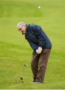 8 October 2012; Well known faces from the world of sport and entertainment came out in force to help raise funds and awareness for the Irish Motor Neurone Disease Association. Pictured is Tyrone footbal manager Mickey Harte as he plays his 3rd shot to the 11th green during the IMNDA Golf Classic at Carton House. Carton House, Maynooth, Co. Kildare. Picture credit: Brendan Moran / SPORTSFILE