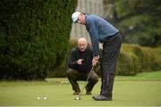 8 October 2012; Well known faces from the world of sport and entertainment came out in force to help raise funds and awareness for the Irish Motor Neurone Disease Association. Pictured is former Irish cricket captain Trent Johnston receiving a few tips from former Down footballer Conor Deegan during the IMNDA Golf Classic at Carton House. Carton House, Maynooth, Co. Kildare. Picture credit: Brendan Moran / SPORTSFILE