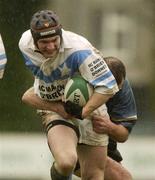 29 December 2002; Dermot O'Sullivan, Garryowen, is tackled by Eric Elwood, Galwegians. Garryowen v Galwegians, AIB All-Ireland League, Division 1, Dooradoyle, Limerick. Rugby. Picture credit; Brendan Moran / SPORTSFILE *EDI*