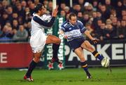 10 January 2003; Denis Hickie, Leinster, kicks ahead of Gavin Henson, Swansea. Leinster v Swansea, Heineken European Rugby Cup, Donnybrook, Dublin. Picture credit; Damien Eagers / SPORTSFILE *EDI*
