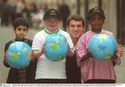 13 January 2002; Legendary soccer star Roy Keane linked up with irish and international children to launch the &quot;Support an Athlete Programme&quot;, sponsored by RTE, the main public fundraising initiative of the 2003 Special Olympic World Games. Pictured with Roy are, from left, Amandeep Sing from India, Irish athlete Kiera Richards and Ron Maptawa, from Congo. 2003SOWG. Picture credit; Brendan Moran / SPORTSFILE