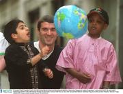 13 January 2002; Legendary soccer star Roy Keane linked up with irish and international children to launch the &quot;Support an Athlete Programme&quot;, sponsored by RTE, the main public fundraising initiative of the 2003 Special Olympic World Games. Pictured with Roy are, from left, international children Amandeep Sing, from India and Ron Maptawa, from the Congo. 2003SOWG. Picture credit; Brendan Moran / SPORTSFILE