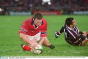 18 January 2003; Munster's John Kelly touches down his sides 4th try in the last minute of the game against Gloucester. Munster v Gloucester, Heineken European Cup, Thomond Park,  Limerick. Rugby. Picture credit; Pat Murphy / SPORTSFILE
