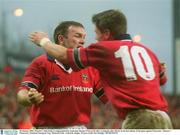 18 January 2003; Munster's John Kelly is congratulated by team-mate Ronan O'Gara (10) after scoring his sides 4th try in the last minute of the game against Gloucester. Munster v Gloucester, Heineken European Cup, Thomond Park,  Limerick. Rugby. Picture credit; Pat Murphy / SPORTSFILE