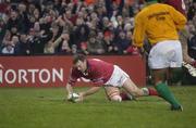 18 January 2003; Munster's John Kelly touches down his sides 4th try in the last minute of the game against Gloucester. Munster v Gloucester, Heineken European Cup, Thomond Park,  Limerick. Rugby. Picture credit; Brendan Moran / SPORTSFILE *EDI*