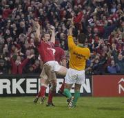 18 January 2003; Munster's John Kelly celebrates scoring his sides 4th try, signalled by referee Joel Jutge, in the last minute of the game against Gloucester. Munster v Gloucester, Heineken European Cup, Thomond Park,  Limerick. Rugby. Picture credit; Brendan Moran / SPORTSFILE *EDI*
