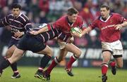 18 January 2003; Munster's Ronan O'Gara, supported by Jason Holland, right, is tackled by Phil Vickery, Gloucester. Munster v Gloucester, Heineken European Cup, Thomond Park,  Limerick. Rugby. Picture credit; Brendan Moran / SPORTSFILE *EDI*