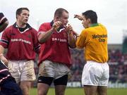18 January 2003; Munster's Frank Sheahan has a word with referee Joel Jutge. Munster v Gloucester, Heineken European Cup, Thomond Park,  Limerick. Rugby. Picture credit; Brendan Moran / SPORTSFILE *EDI*