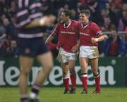 18 January 2003; Munster's Ronan O'Gara, right, and Jason Holland celebrate victory over Gloucester. Heineken European Cup, Munster v Gloucester, Thomond Park Limerick. Rugby. Picture credit; Brendan Moran / SPORTSFILE *EDI*