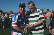 18 January 2003; GAA President Sean McCague makes a presentation to Armagh's Benny Tierney after the game. Vodafone GAA All-Star Exhibition Game, Vodafone 2002 All-Stars v Vodafone 2001 All-Stars, University of San Diego, Alcalá Park, San Diego, California, USA. Picture credit; Ray McManus / SPORTSFILE *EDI*