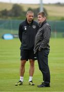 10 October 2012; Republic of Ireland's Jonathan Walters speaking with Shamrock Rovers director of football Brian Laws following squad training ahead of their side's FIFA World Cup Qualifier match against Germany on Friday. Republic of Ireland Squad Training, Gannon Park, Malahide, Co. Dublin. Picture credit: Stephen McCarthy / SPORTSFILE