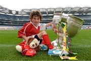 10 October 2012; Pictured at the Kellogg’s Cúl Dream Day Out in Croke Park is Oisin McCarthy, age 6, from Innishannon, Co. Cork, with 'Mario' and the Sam Maguire Cup. 82,000 children participated in Kellogg's GAA Cúl Camps in 2012, an increase of almost 6% on 2011, proving that the camps are one of the most popular summer camps, selected by Irish families. Over 1,000 clubs throughout the country hosted Kellogg's GAA Cúl Camps, during the summer of 2012, with the highest numbers participating in GAA strongholds like Dublin, Cork, Galway, Limerick and Kildare. Counties like Meath, Westmeath and Longford also saw a huge surge in camp registrations with numbers up by 41% in Meath, 34% in Westmeath, 21% in Mayo, 20% in Longford and 8% in Donegal. Croke Park, Dublin. Picture credit: Brian Lawless / SPORTSFILE