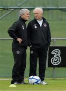 10 October 2012; Republic of Ireland manager Giovanni Trapattoni in conversation with equipment officer Mick Lawlor during squad training ahead of his side's FIFA World Cup Qualifier match against Germany on Friday. Republic of Ireland Squad Training, Gannon Park, Malahide, Co. Dublin. Picture credit: Stephen McCarthy / SPORTSFILE