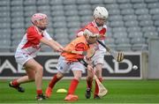 10 October 2012; Pictured at the Kellogg’s Cúl Dream Day Out in Croke Park are Andrew Clinton, centre, age 9, from Castleconnell, Co. Limerick, in action against Ava Conlon, left, age 11, from Salthill, Co. Galway, and Dearbhla McMahon, age 10, from Clarecastle, Co. Clare. 82,000 children participated in Kellogg's GAA Cúl Camps in 2012, an increase of almost 6% on 2011, proving that the camps are one of the most popular summer camps, selected by Irish families. Over 1,000 clubs throughout the country hosted Kellogg's GAA Cúl Camps, during the summer of 2012, with the highest numbers participating in GAA strongholds like Dublin, Cork, Galway, Limerick and Kildare. Counties like Meath, Westmeath and Longford also saw a huge surge in camp registrations with numbers up by 41% in Meath, 34% in Westmeath, 21% in Mayo, 20% in Longford and 8% in Donegal. Croke Park, Dublin. Picture credit: Barry Cregg / SPORTSFILE
