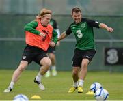 10 October 2012; Republic of Ireland's Simon Cox, right, in action against Paul McShane during squad training ahead of their side's FIFA World Cup Qualifier match against Germany on Friday. Republic of Ireland Squad Training, Gannon Park, Malahide, Co. Dublin. Picture credit: David Maher / SPORTSFILE