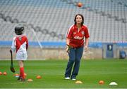 10 October 2012; Pictured at the Kellogg’s Cúl Dream Day Out in Croke Park is Wexford's Ursula Jacob showing her skills to a Cúl Dream Day Out winner. 82,000 children participated in Kellogg's GAA Cúl Camps in 2012, an increase of almost 6% on 2011, proving that the camps are one of the most popular summer camps, selected by Irish families. Over 1,000 clubs throughout the country hosted Kellogg's GAA Cúl Camps, during the summer of 2012, with the highest numbers participating in GAA strongholds like Dublin, Cork, Galway, Limerick and Kildare. Counties like Meath, Westmeath and Longford also saw a huge surge in camp registrations with numbers up by 41% in Meath, 34% in Westmeath, 21% in Mayo, 20% in Longford and 8% in Donegal. Croke Park, Dublin. Picture credit: Barry Cregg / SPORTSFILE