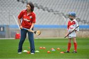 10 October 2012; Pictured at the Kellogg’s Cúl Dream Day Out in Croke Park is Wexford's Ursula Jacob gives instructions to Cúl Dream Day Out winners. 82,000 children participated in Kellogg's GAA Cúl Camps in 2012, an increase of almost 6% on 2011, proving that the camps are one of the most popular summer camps, selected by Irish families. Over 1,000 clubs throughout the country hosted Kellogg's GAA Cúl Camps, during the summer of 2012, with the highest numbers participating in GAA strongholds like Dublin, Cork, Galway, Limerick and Kildare. Counties like Meath, Westmeath and Longford also saw a huge surge in camp registrations with numbers up by 41% in Meath, 34% in Westmeath, 21% in Mayo, 20% in Longford and 8% in Donegal. Croke Park, Dublin. Picture credit: Barry Cregg / SPORTSFILE