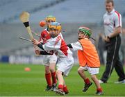 10 October 2012; Pictured at the Kellogg’s Cúl Dream Day Out in Croke Park are James Ryan, left, age 7, from Templemore, Co. Tipperary, in action against Ferdia O Nuallain, age 6, from Rathcoole, Co. Dublin. 82,000 children participated in Kellogg's GAA Cúl Camps in 2012, an increase of almost 6% on 2011, proving that the camps are one of the most popular summer camps, selected by Irish families. Over 1,000 clubs throughout the country hosted Kellogg's GAA Cúl Camps, during the summer of 2012, with the highest numbers participating in GAA strongholds like Dublin, Cork, Galway, Limerick and Kildare. Counties like Meath, Westmeath and Longford also saw a huge surge in camp registrations with numbers up by 41% in Meath, 34% in Westmeath, 21% in Mayo, 20% in Longford and 8% in Donegal. Croke Park, Dublin. Picture credit: Barry Cregg / SPORTSFILE