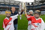10 October 2012; Pictured at the Kellogg’s Cúl Dream Day Out in Croke Park is Kilkenny hurler Richie Hogan with Kilkenny supporters, from left, Zoe O'Gorman, age 12, from Windgap, Ciara Foskin, age 13, and Sean Fitzpatrick, age 13, from Mullinavat. 82,000 children participated in Kellogg's GAA Cúl Camps in 2012, an increase of almost 6% on 2011, proving that the camps are one of the most popular summer camps, selected by Irish families. Over 1,000 clubs throughout the country hosted Kellogg's GAA Cúl Camps, during the summer of 2012, with the highest numbers participating in GAA strongholds like Dublin, Cork, Galway, Limerick and Kildare. Counties like Meath, Westmeath and Longford also saw a huge surge in camp registrations with numbers up by 41% in Meath, 34% in Westmeath, 21% in Mayo, 20% in Longford and 8% in Donegal. Croke Park, Dublin. Picture credit: Brian Lawless / SPORTSFILE