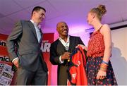 10 October 2012; Former undisputed heavyweight boxing champion Mike Tyson is presented with a Munster rugby jersey by Mike O'Regan and Laura O'Regan, age 13, from Bantry, Co. Cork. Thomond Park, Limerick. Picture credit: Diarmuid Greene / SPORTSFILE