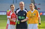 7 October 2012; Referee Seamus Regan with team captains Áine McGee, Louth, left, and Clare Timoney, Antrim, before the game. TG4 All-Ireland Ladies Football Junior Championship Final, Antrim v Louth, Croke Park, Dublin. Picture credit: Brendan Moran / SPORTSFILE