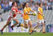 7 October 2012; Maeve McCurdy, Antrim, in action against Anne Marie Lynch, and Aine McGee, right, Louth. TG4 All-Ireland Ladies Football Junior Championship Final, Antrim v Louth, Croke Park, Dublin. Picture credit: Brendan Moran / SPORTSFILE