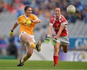7 October 2012; Maeve McCurdy, Antrim, in action against Aine McGee, Louth. TG4 All-Ireland Ladies Football Junior Championship Final, Antrim v Louth, Croke Park, Dublin. Picture credit: Brendan Moran / SPORTSFILE