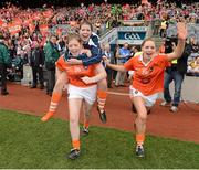 7 October 2012; Armagh players, from left, Shannen O'Grady, Frances Quinn and Rebecca O'Reilly celebrate at the final whistle. TG4 All-Ireland Ladies Football Intermediate Championship Final, Armagh v Waterford, Croke Park, Dublin. Picture credit: Brendan Moran / SPORTSFILE