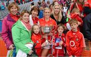 7 October 2012; Cork's Angela Walsh celebrates with her family after the game.  TG4 All-Ireland Ladies Football Senior Championship Final, Cork v Kerry, Croke Park, Dublin. Picture credit: Brendan Moran / SPORTSFILE