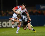 12 October 2012; Tommy Bowe, Ulster, is tackled by Marc Andreu, Castres Olympique. Heineken Cup 2012/13, Pool 4, Round 1, Ulster v Castres Olympique, Ravenhill Park, Belfast, Co. Antrim. Picture credit: Oliver McVeigh / SPORTSFILE