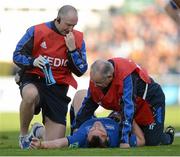13 October 2012; Cian Healy, Leinster, is treated by team physiotherapist Garreth Farrell, left, and team doctor Dr. Arthur Tanner. Heineken Cup 2012/13 - Pool 5, Round 1, Leinster v Exeter Chiefs, RDS, Ballsbridge, Dublin. Picture credit: Stephen McCarthy / SPORTSFILE