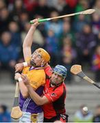 14 October 2012; Rhys Clarke, Faythe Harriers, in action against Dennis Morton, Oulart-the-Ballagh. Wexford County Senior Hurling Championship Final, Oulart-the-Ballagh v Faythe Harriers, Wexford Park, Wexford. Photo by Sportsfile