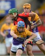 14 October 2012; Keith Rossiter, Oulart-the-Ballagh, in action against Paul Lambert, left, and Padraig Farrell, Faythe Harriers. Wexford County Senior Hurling Championship Final, Oulart-the-Ballagh v Faythe Harriers, Wexford Park, Wexford. Photo by Sportsfile