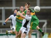 14 October 2012; Thomas Deehan, Clara, in action against Brian Darby, Rhode. Offaly County Senior Football Championship Final, Rhode v Clara, O'Connor Park, Tullamore, Co. Offaly. Picture credit: Brian Lawless / SPORTSFILE