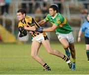 14 October 2012; Aaron Cunningham, Crossmaglen Rangers, in action against Darnell Parkinson, Pearse Og. Armagh County Senior Football Championship Final, Crossmaglen Rangers v Pearse Og, Morgan Athletic Grounds, Armagh. Picture credit: Oliver McVeigh / SPORTSFILE