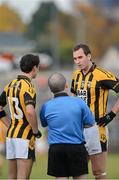 14 October 2012; Jamie Clarke and David McKenna, Crossmaglen Rangers, in conversation with referee Stephen Murray. Armagh County Senior Football Championship Final, Crossmaglen Rangers v Pearse Og, Morgan Athletic Grounds, Armagh. Picture credit: Oliver McVeigh / SPORTSFILE