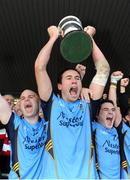 14 October 2012; Salthill Knocknacarra captain Finian Hanley lifts the Frank Fox Cup alongside his team-mates. Galway County Senior Football Championship Final, Tuam Stars v Salthill Knocknacarra, Pearse Stadium, Galway. Picture credit: Ray Ryan / SPORTSFILE