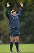 15 October 2012; Leinster's Mike Ross stretches during squad training ahead of their side's Heineken Cup, Pool 5, Round 2, game against Scarlets on Saturday. Leinster Rugby Squad Training, Rosemount, UCD, Belfield, Dublin. Picture credit: Stephen McCarthy / SPORTSFILE